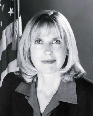 Janet Rehnquist headshot in greyscale