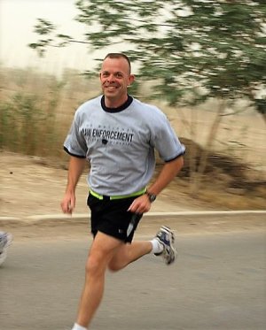 Martin Rowe in Iraq during the Law Enforcement Memorial Torch run
